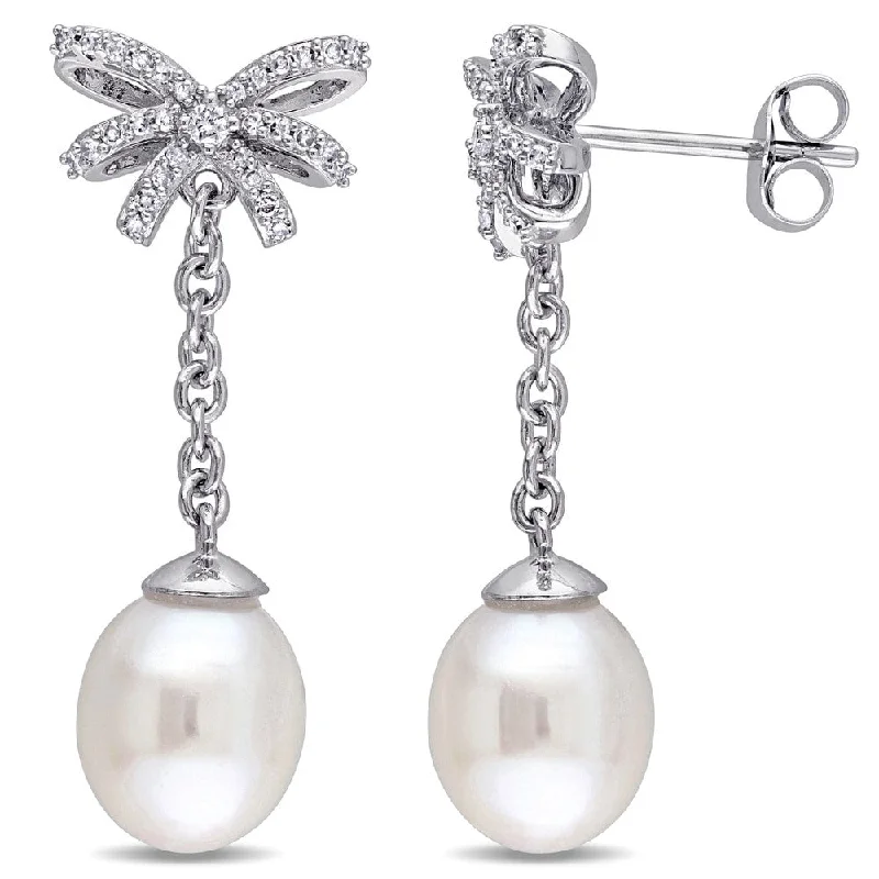 Miadora 10k White Gold 1/5ct TDW Diamond and Cultured Freshwater Pearl Bow Dangle Earrings(G-H, I2,I3) (8-8.5 mm)