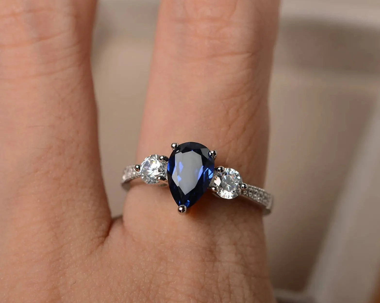 Pear cut blue sapphire ring