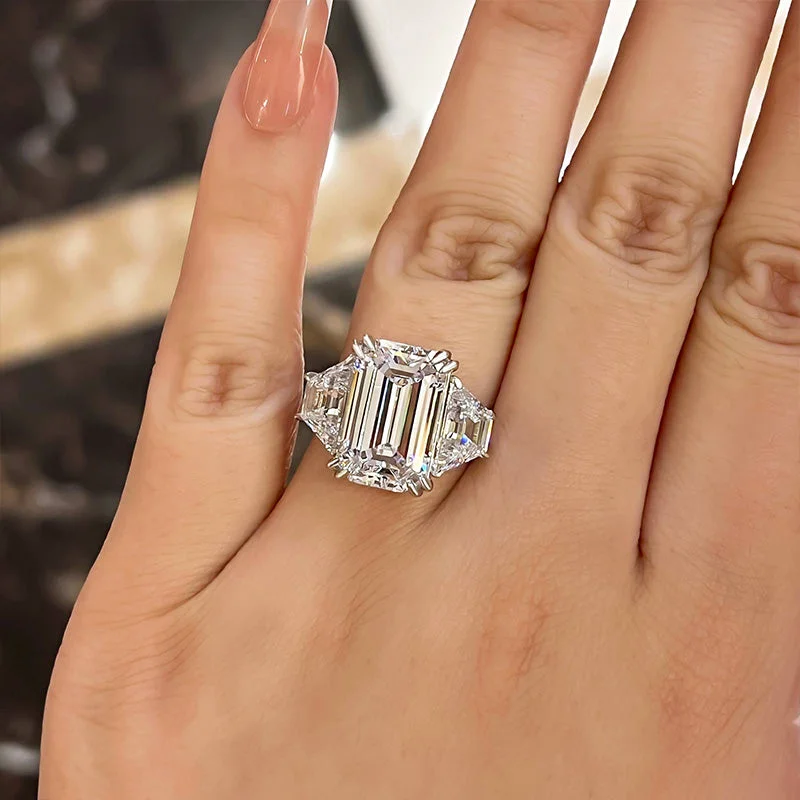 Gorgeous Emerald Cut Three Stone Engagement Ring In Sterling Silver